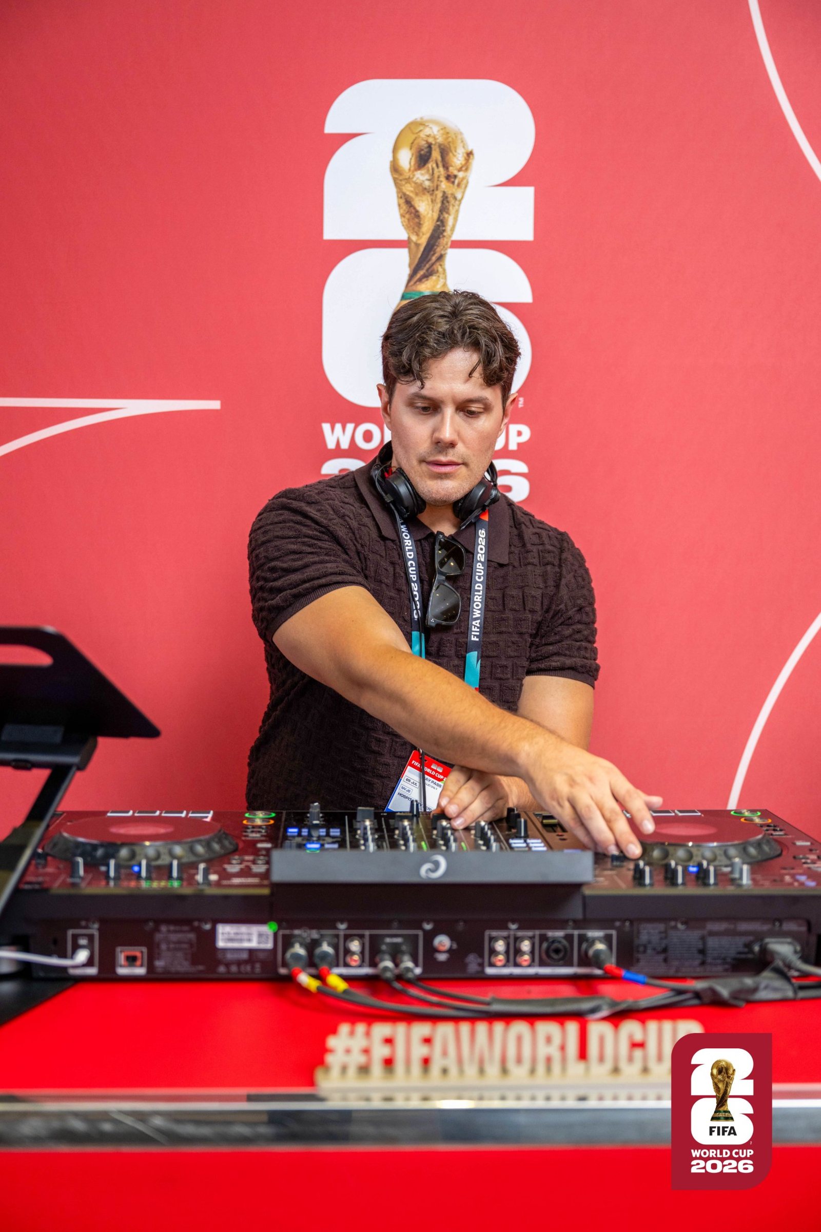 Elvis Suarez DJing in the pitch-side lounge, FIFA World Cup 2026.